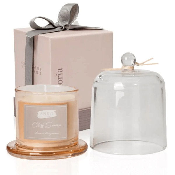 נר ריחני בזכוכית עם מכסה פעמון שקוף באריזת מתנה ורודה מהודרת.